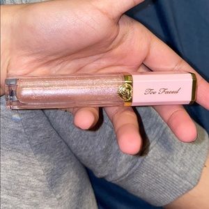 Two faced glitter gloss.